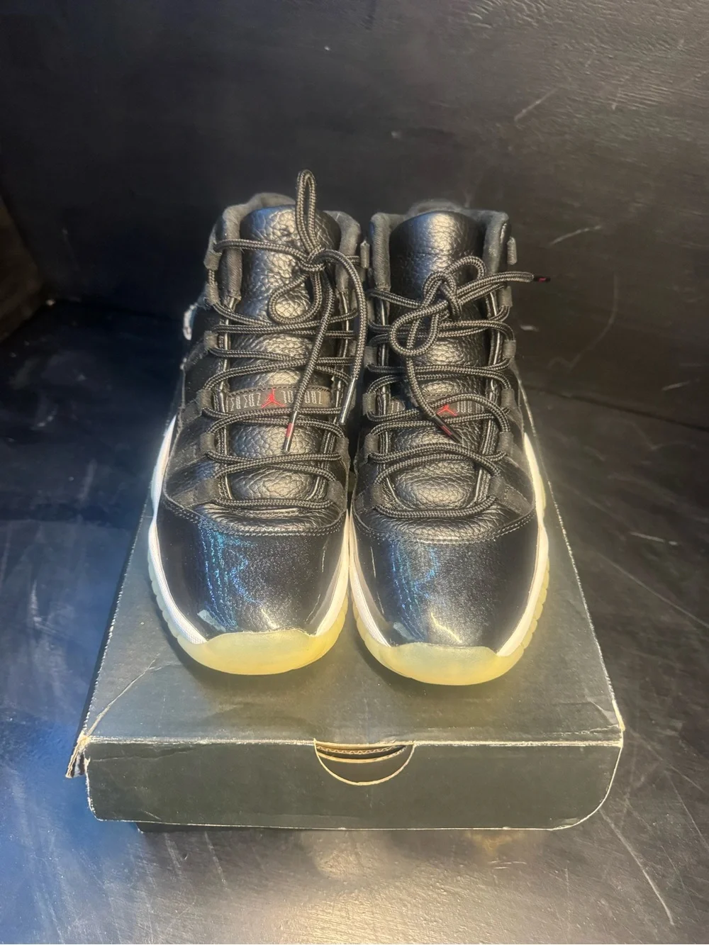 Jordan 11 Retro Mid Black with Gum Sole and Red Jumpman